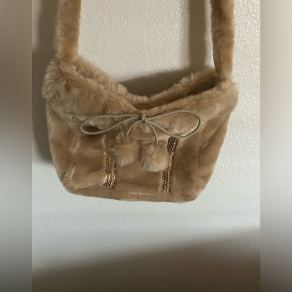 Aldo Handbags - NWOT ALDO faux fur crossbody bag NWOT